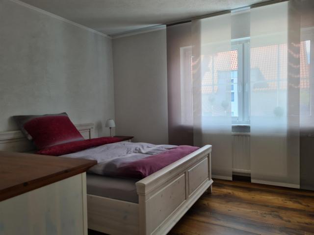 Foto 13_Schlafzimmer 1 OG